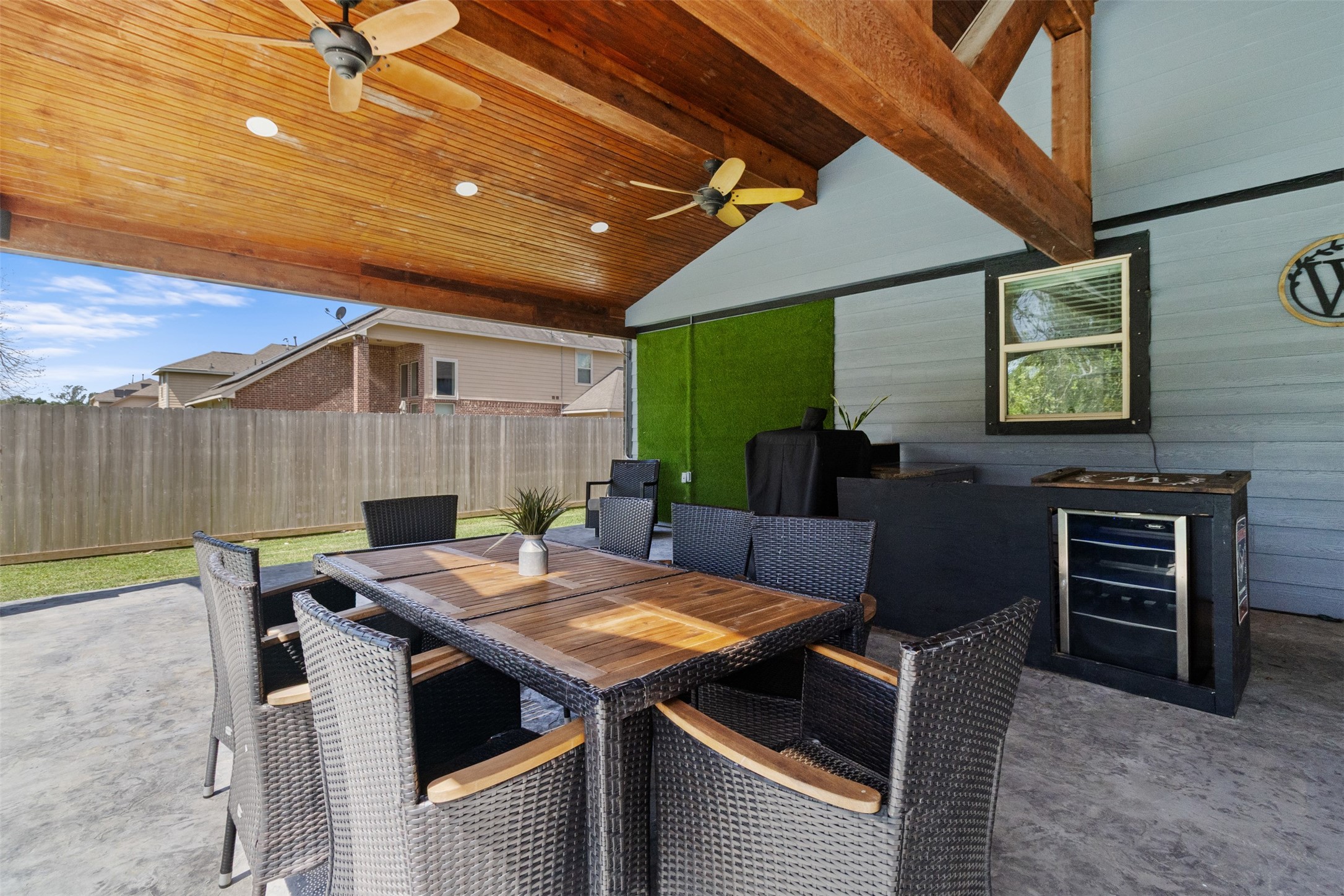 7927 Needlepoint Road Baytown, TX 77521 - Photo 35 of 46 a view of a dinning table and chairs in the patio