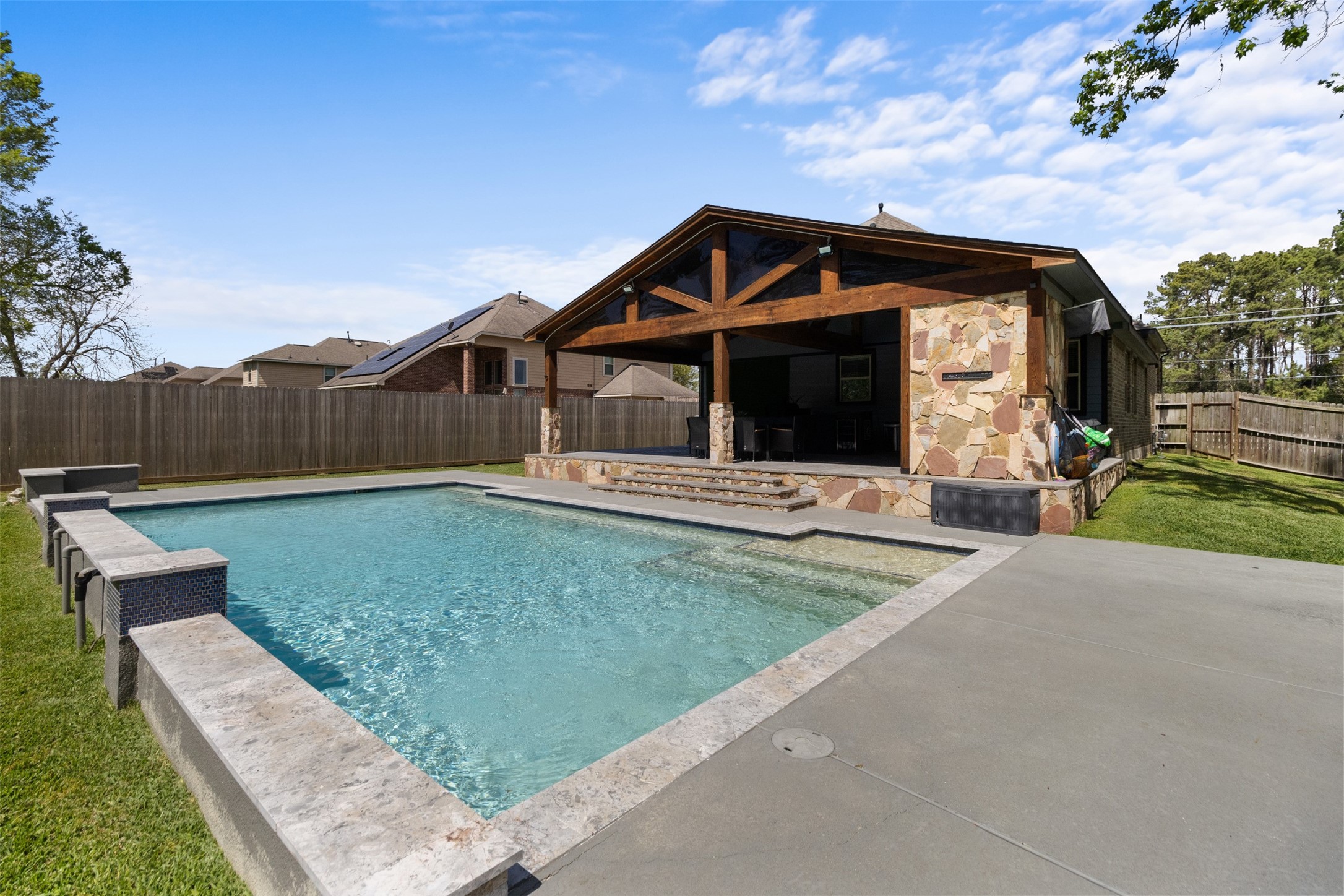 7927 Needlepoint Road Baytown, TX 77521 - Photo 38 of 46 a view of a house with a yard