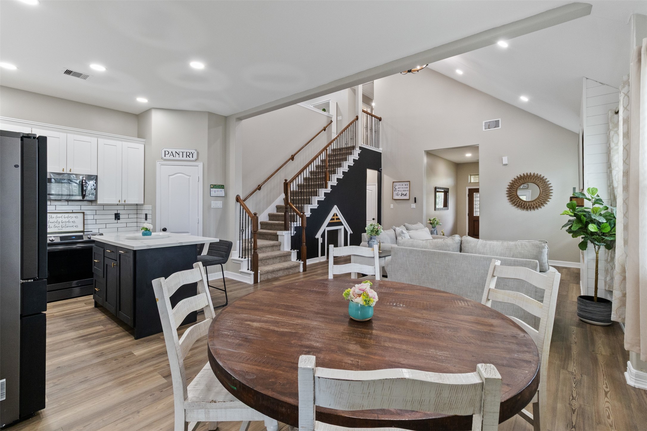 7927 Needlepoint Road Baytown, TX 77521 - Photo 9 of 46 a view of a dining room and livingroom