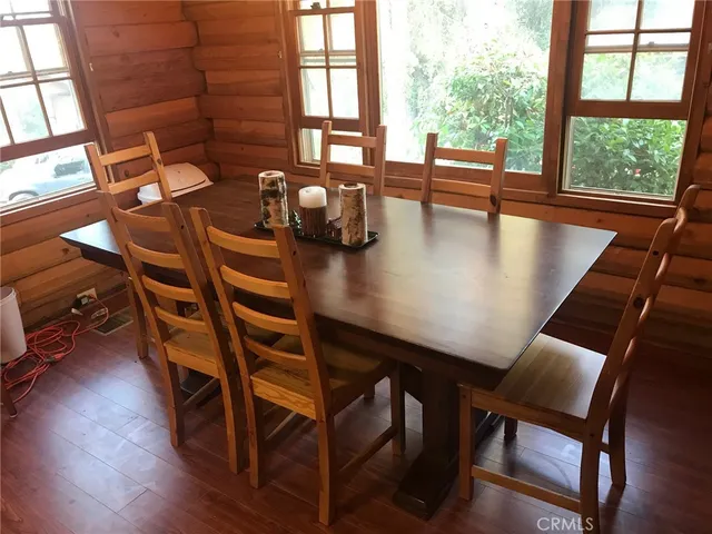 a view of workspace with wooden floor