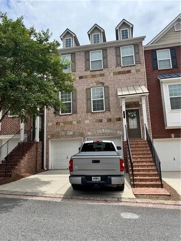 a car parked in front of a house