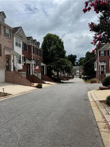 a view of a street with cars