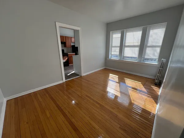 a view of an empty room and window