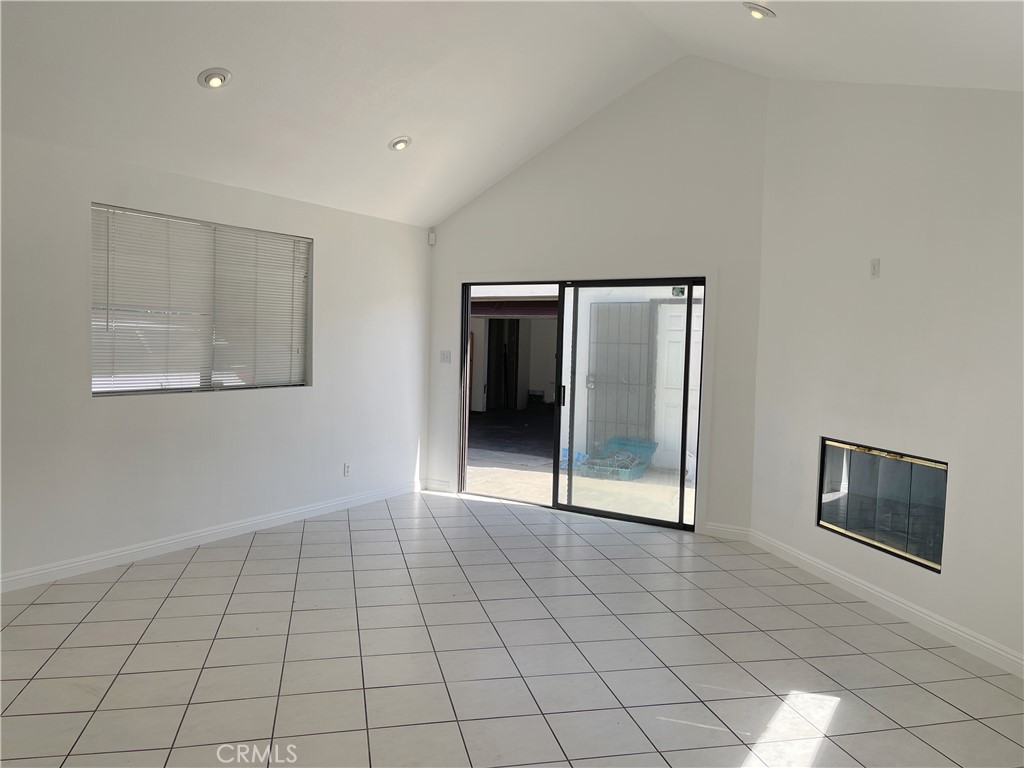 15100 Dunton Drive Whittier, CA 90604 - Photo 16 of 17 a view of an empty room with a mirror