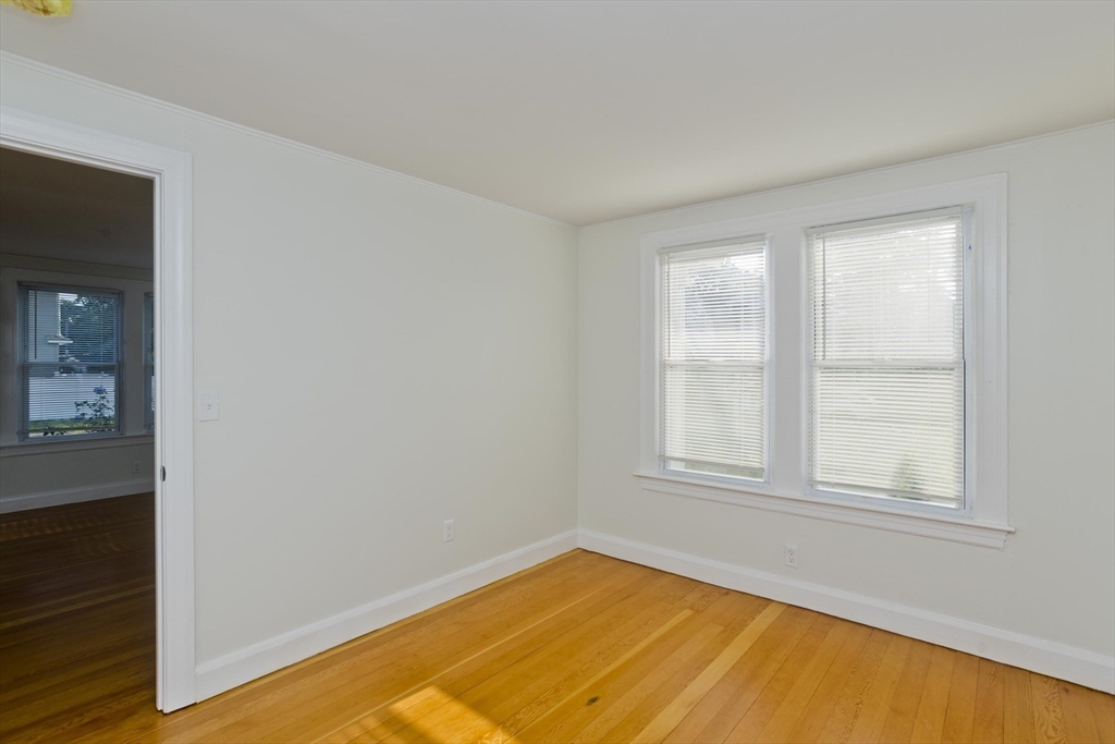 265 Ambrose Street Springfield, MA 01109 - Photo 8 of 24 an empty room with a window