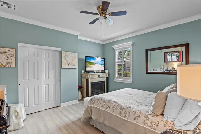 a living room with furniture and next to a window