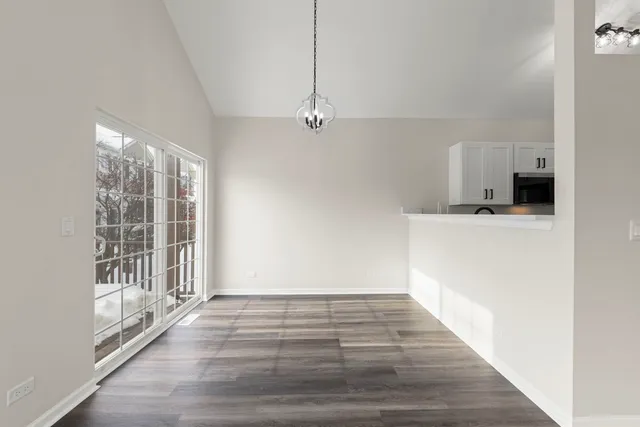 a view of a kitchen with a sink and dishwasher