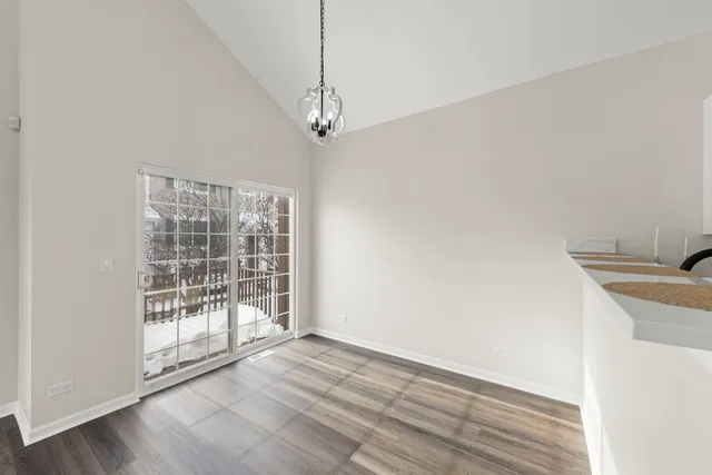 a view of a livingroom with wooden floor