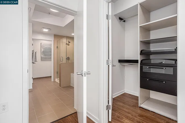 a view of closet area with empty racks