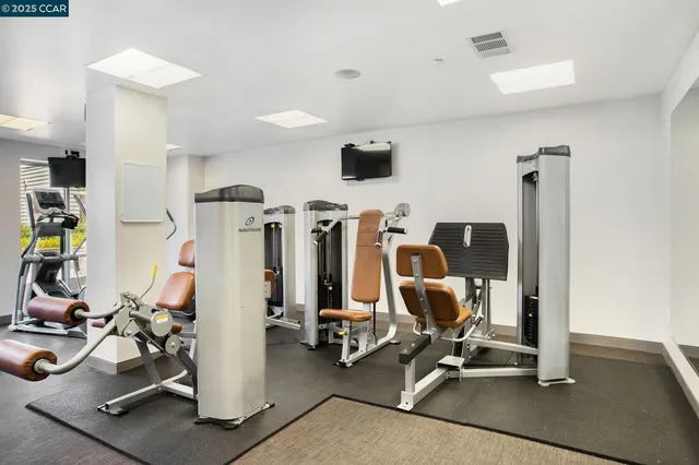 a view of a room with gym equipment