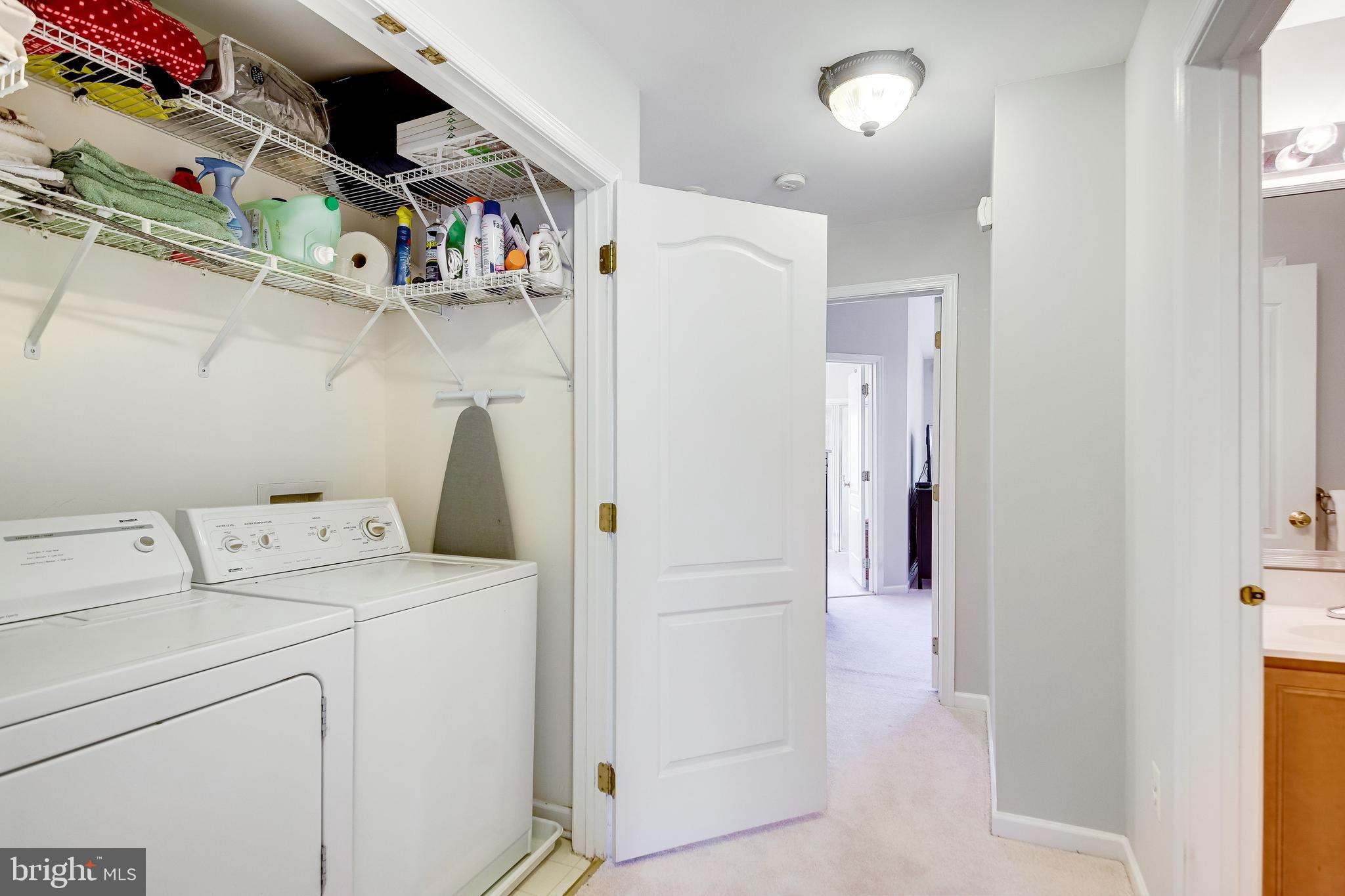 25374 McIntyre Square Chantilly, VA 20152 - Photo 24 of 32 Upper Level Laundry with Shelving