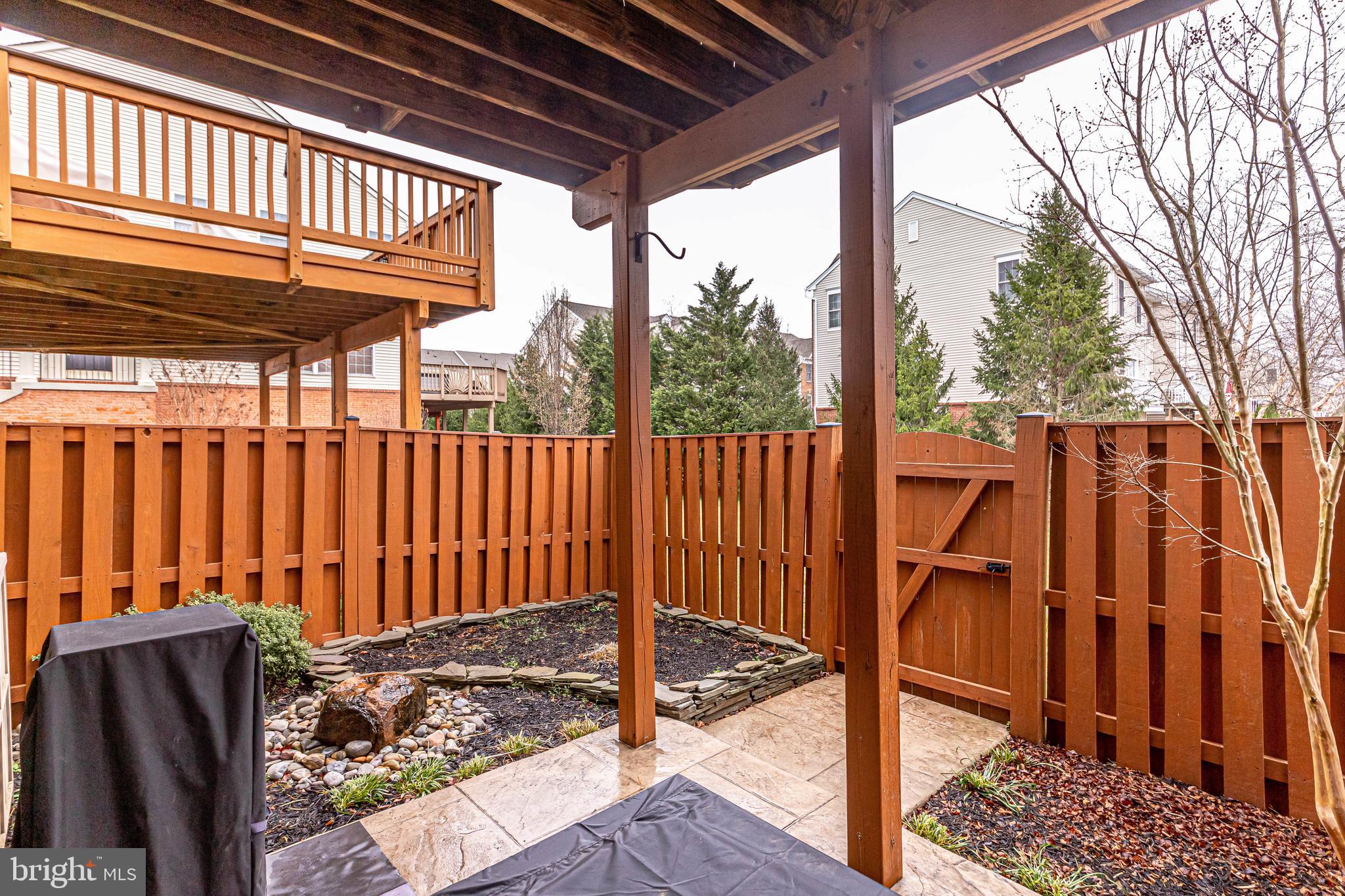 25374 McIntyre Square Chantilly, VA 20152 - Photo 31 of 32 Thoughtfully Designed Garden Fountain Conveys