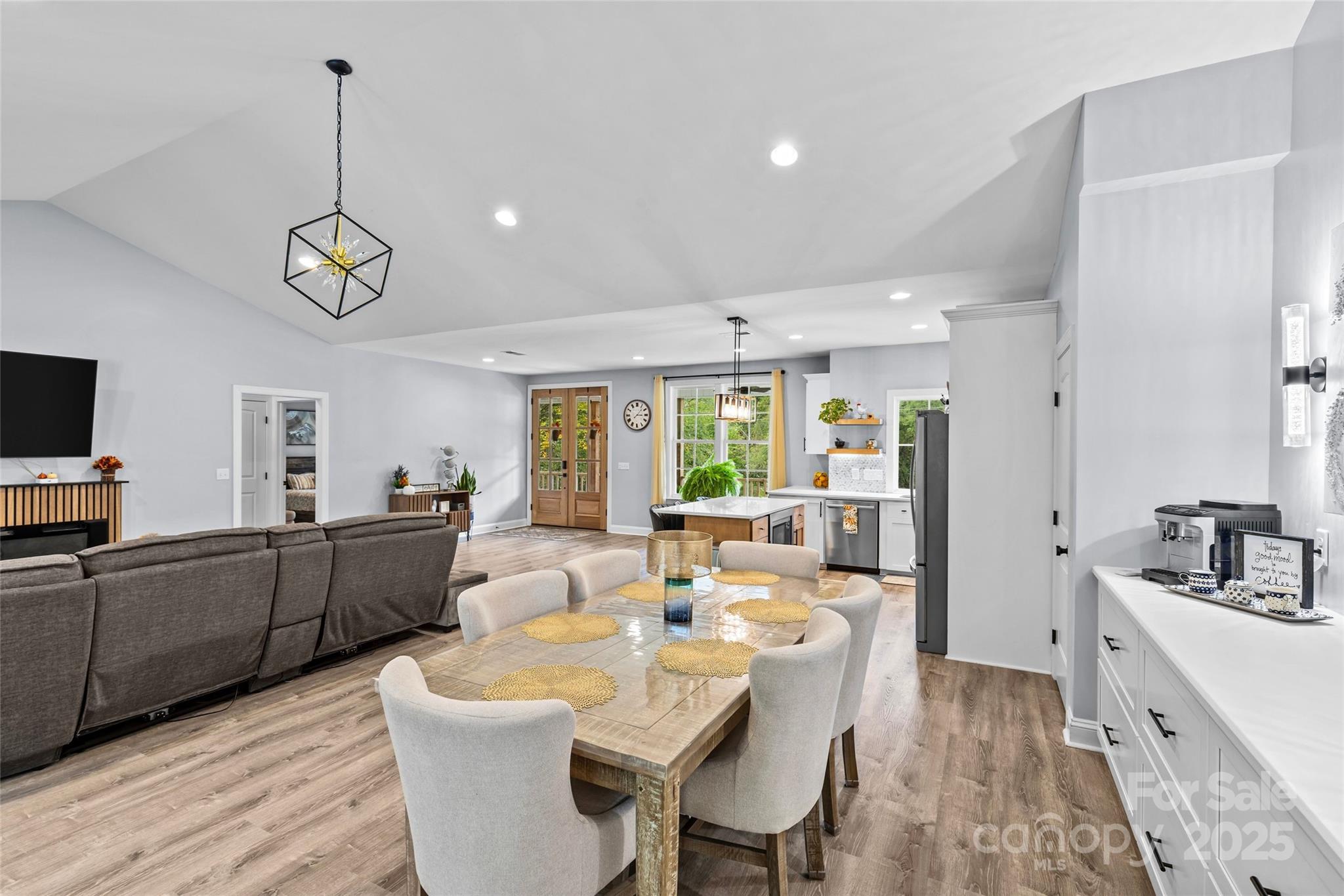 4815 Chadwick Drive Concord, NC 28025 - Photo 16 of 42 a large kitchen with a table and chairs in it