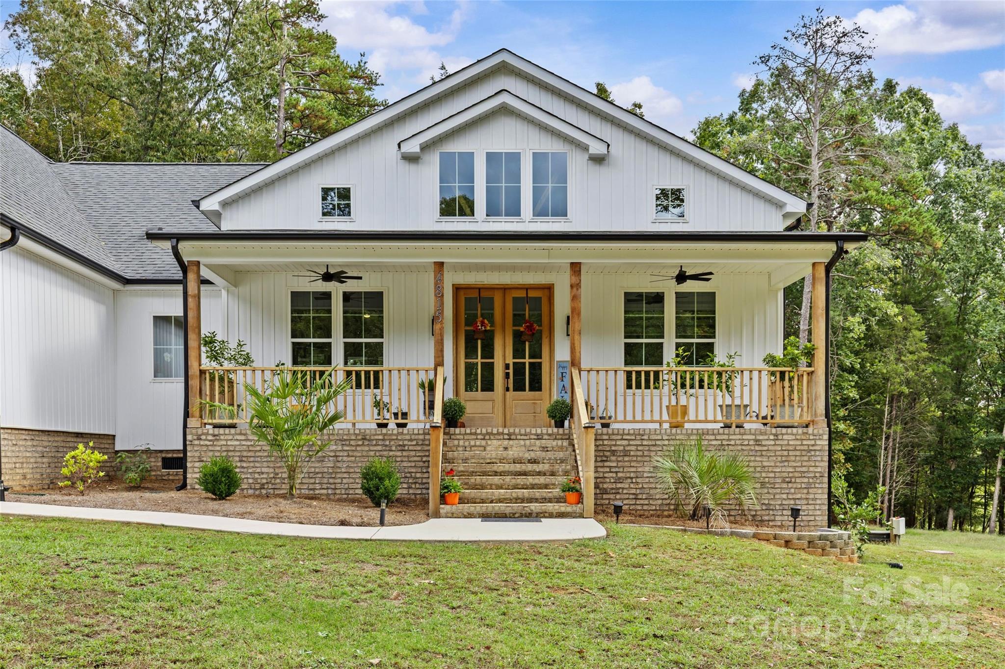 4815 Chadwick Drive Concord, NC 28025 - Photo 2 of 42 a front view of a house with a yard