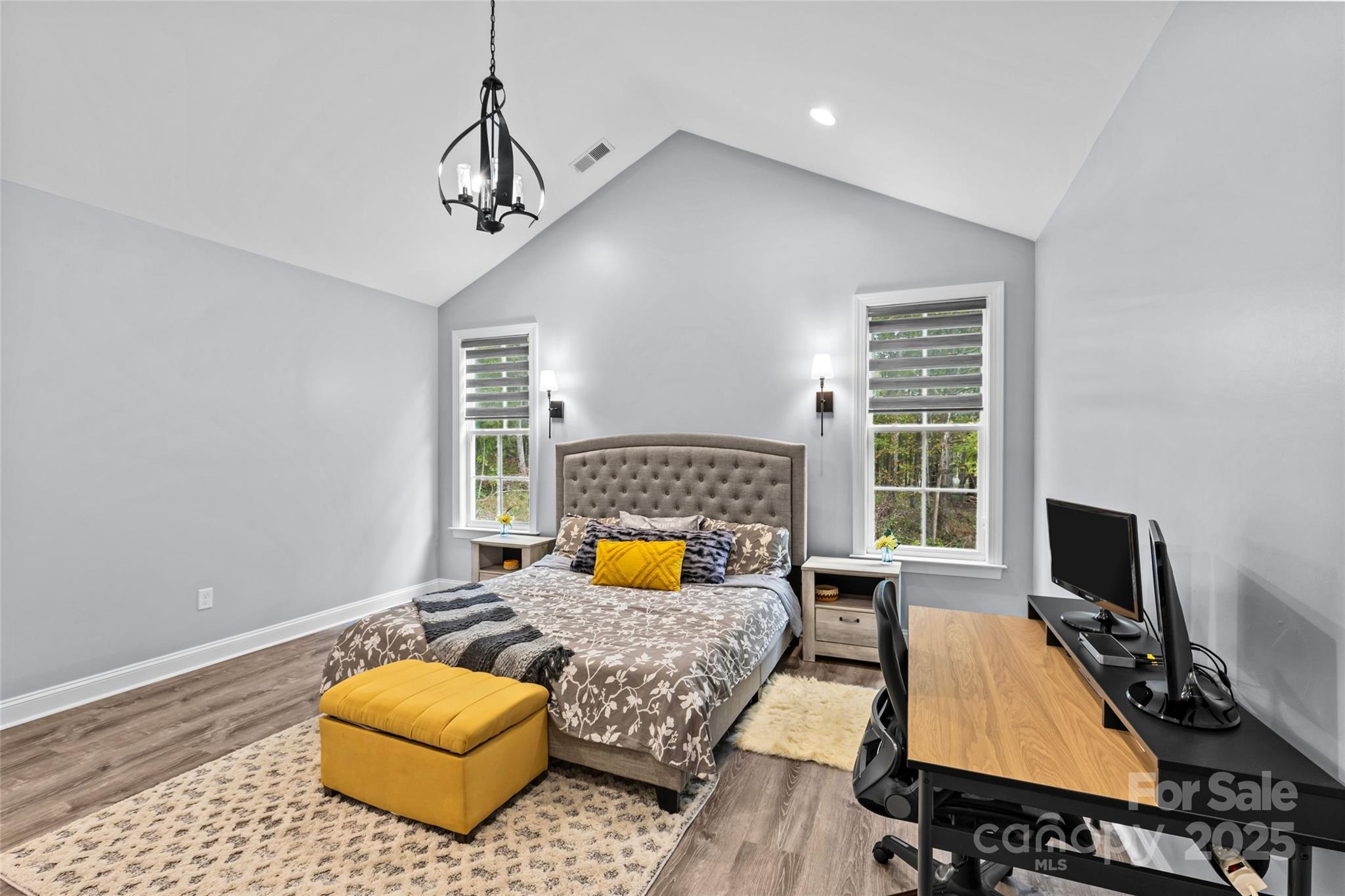 4815 Chadwick Drive Concord, NC 28025 - Photo 21 of 42 a living room with furniture and a flat screen tv