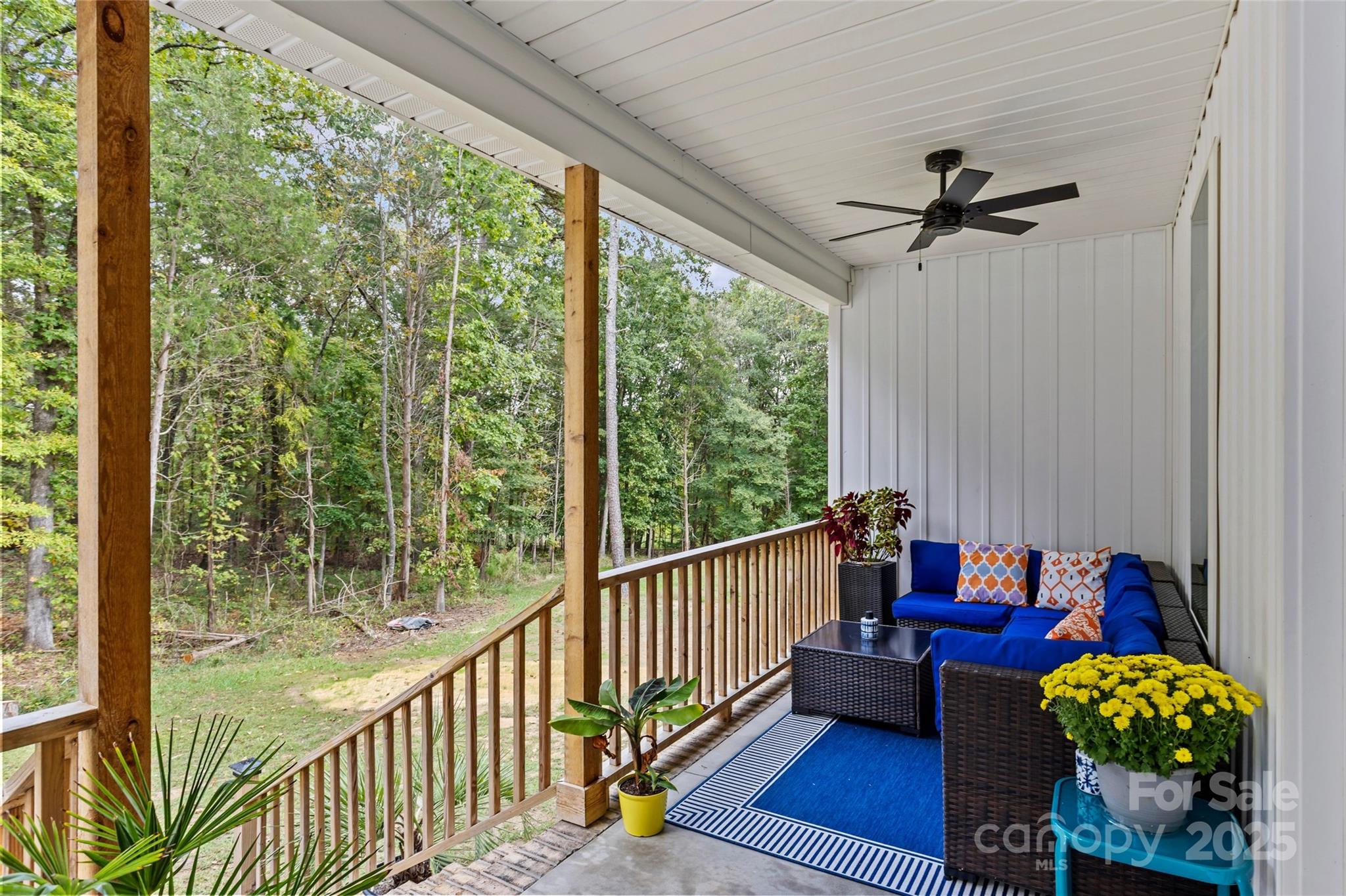 4815 Chadwick Drive Concord, NC 28025 - Photo 34 of 42 a living room with furniture and a table