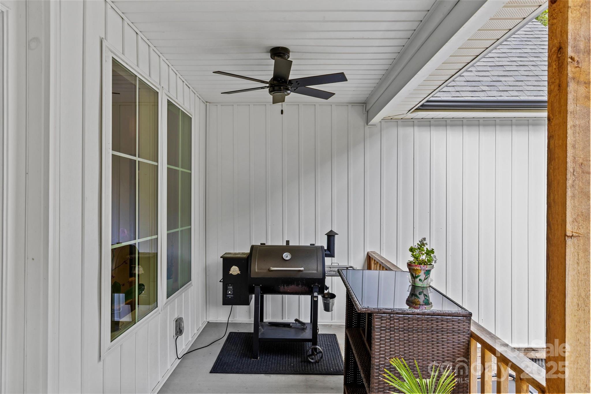 4815 Chadwick Drive Concord, NC 28025 - Photo 36 of 42 a table and chairs in a balcony