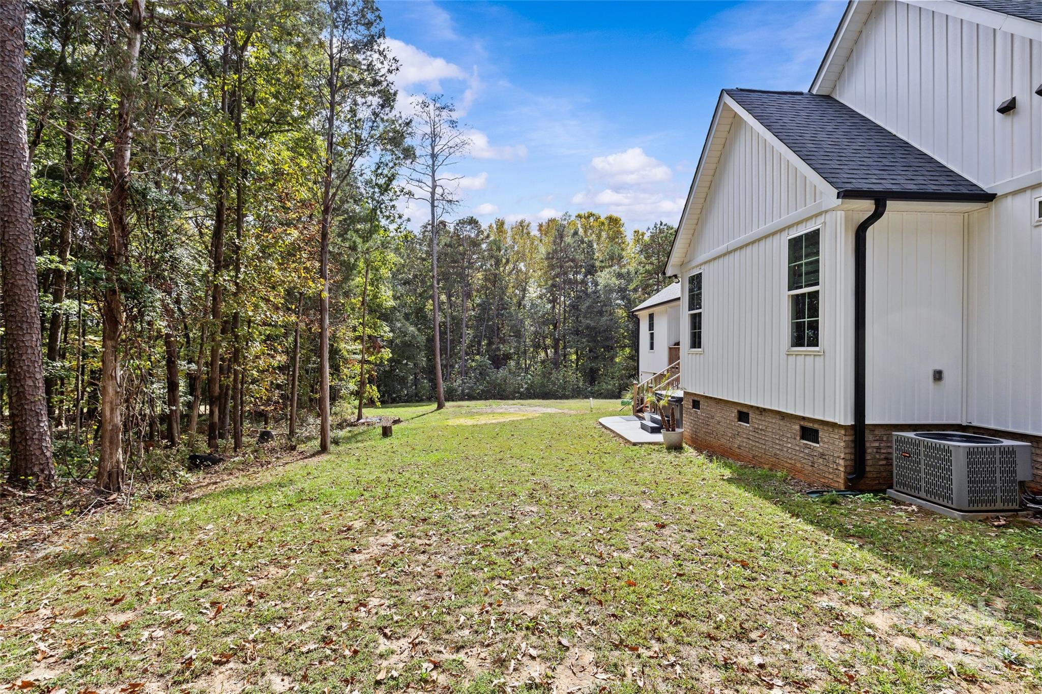 4815 Chadwick Drive Concord, NC 28025 - Photo 38 of 42 a view of a backyard with a tree