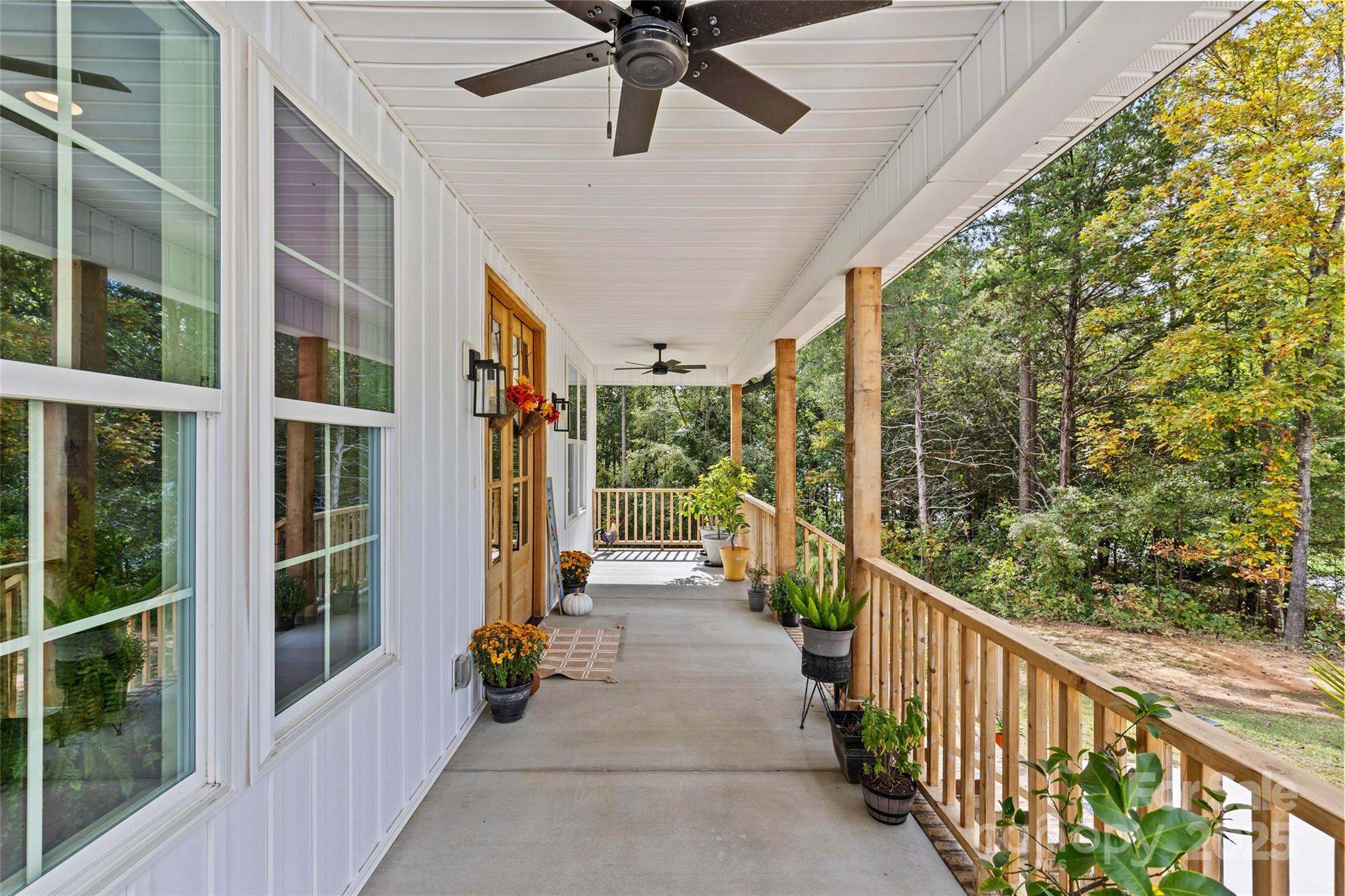 4815 Chadwick Drive Concord, NC 28025 - Photo 4 of 42 a view of a porch with wooden floor and outdoor space
