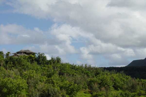 6867 Koolau Road Kilauea, HI 96754 - Photo 2 of 8 a city view with lot of green space