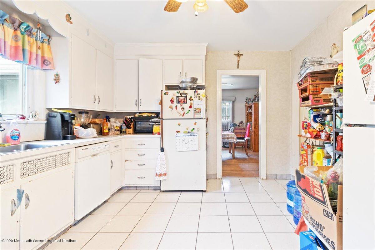 321 Pfister Road Jackson, NJ 08527 - Photo 15 of 30 a kitchen with a cabinets and appliances