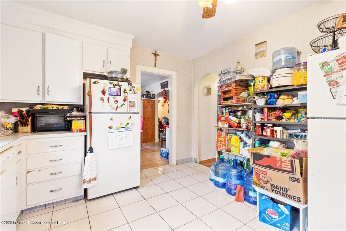 321 Pfister Road Jackson, NJ 08527 - Photo 17 of 30 a kitchen with stainless steel appliances a refrigerator and a stove top oven