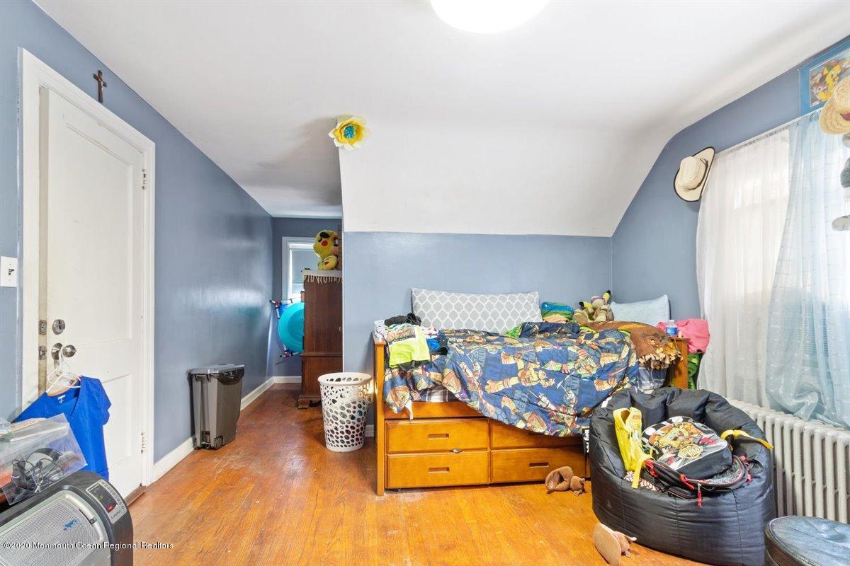 321 Pfister Road Jackson, NJ 08527 - Photo 24 of 30 a bedroom with bed and a window