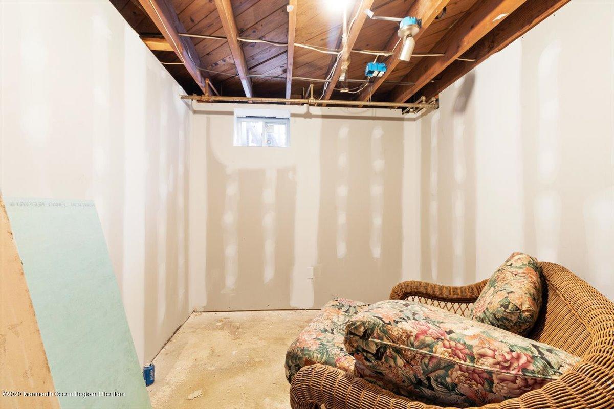 321 Pfister Road Jackson, NJ 08527 - Photo 27 of 30 a bedroom with a bed and a window