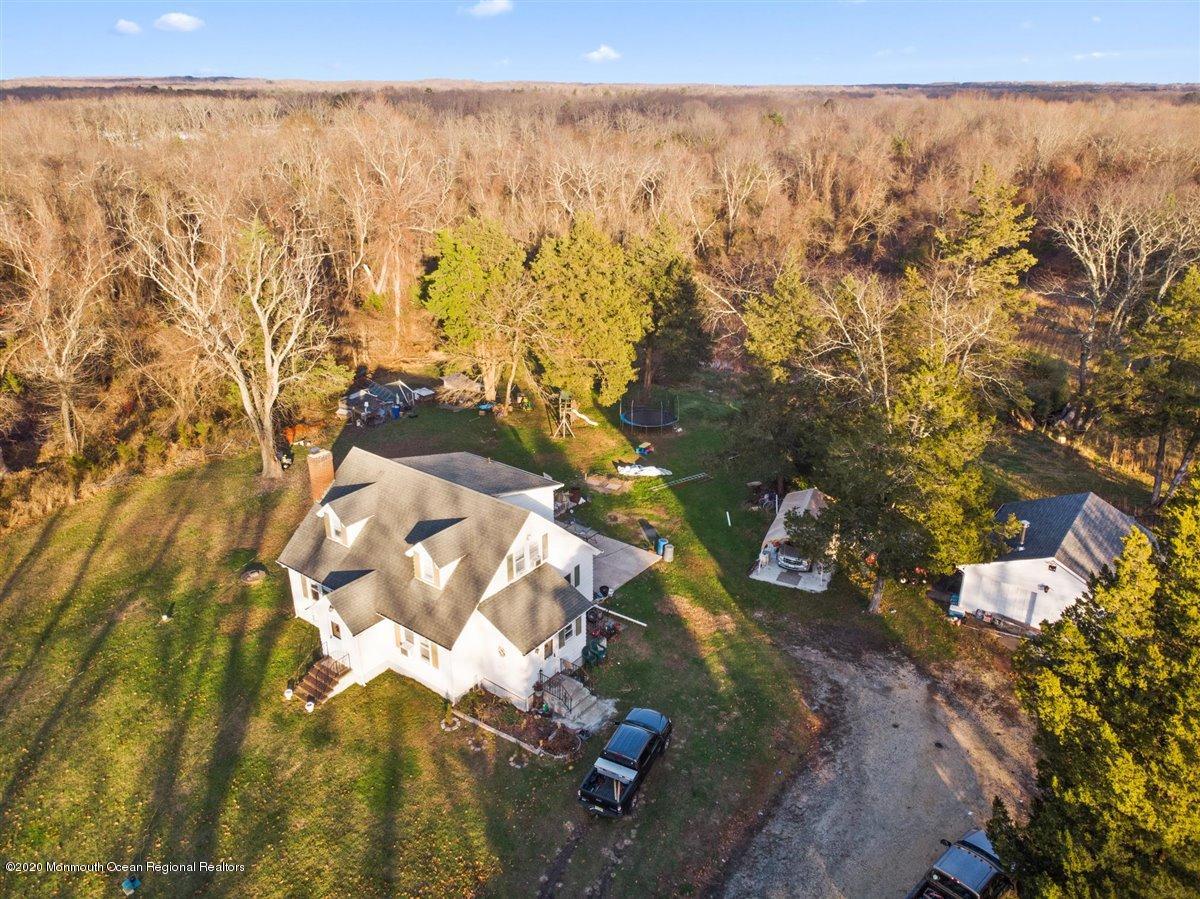 321 Pfister Road Jackson, NJ 08527 - Photo 7 of 30 a view of residential houses with yard