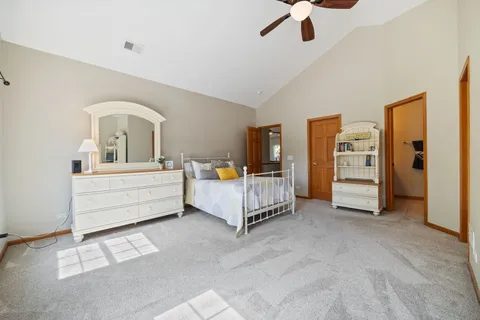 a living room with furniture and white walls