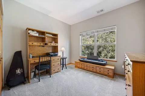 a room with furniture and a window