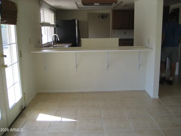 wooden floor and window in a kitchen