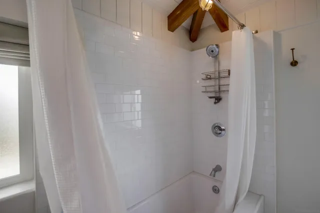 a view of a house with a yard porch and sitting area
