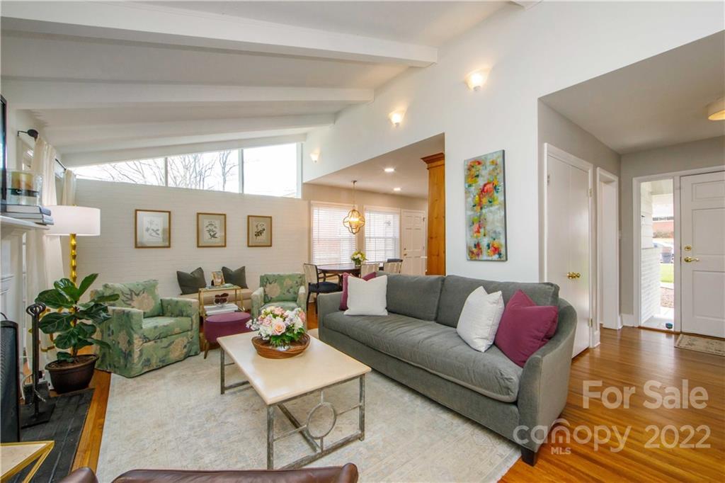 5539 Murrayhill Road Charlotte, NC 28210 - Photo 13 of 46 a living room with furniture and a potted plant