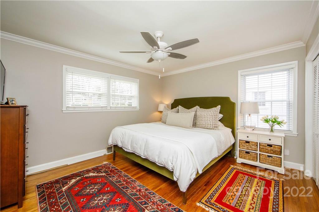 5539 Murrayhill Road Charlotte, NC 28210 - Photo 27 of 46 a bedroom with a bed and a window
