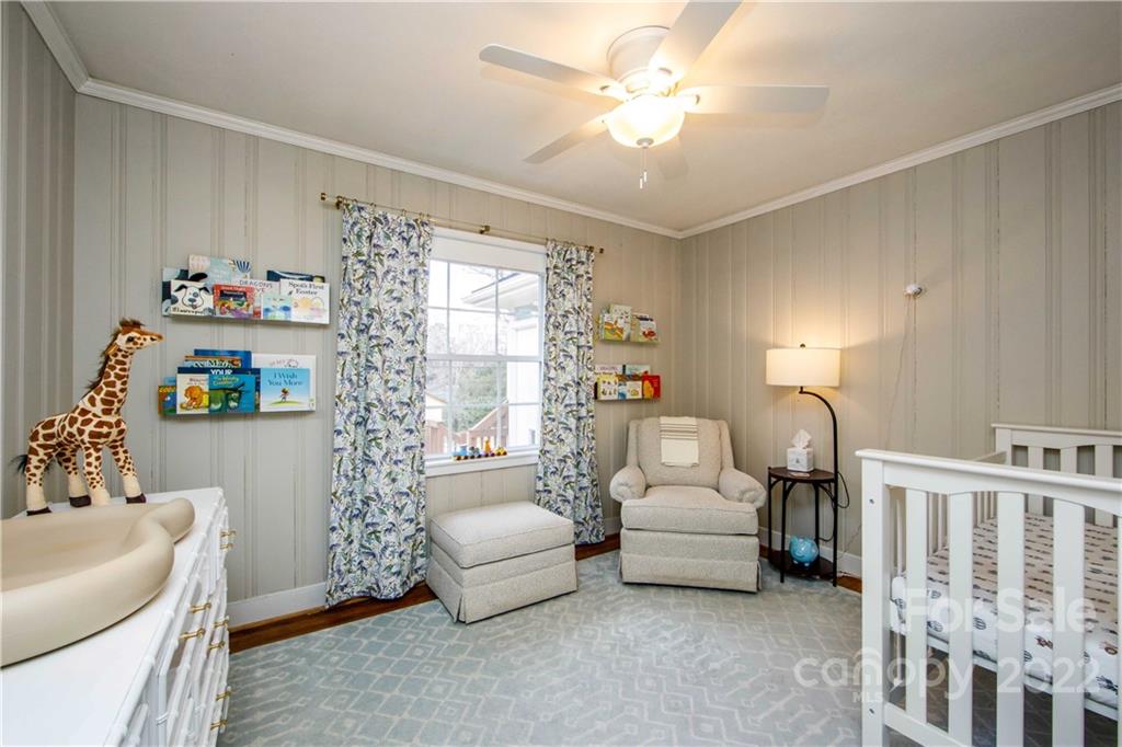 5539 Murrayhill Road Charlotte, NC 28210 - Photo 31 of 46 a living room with furniture and a chandelier