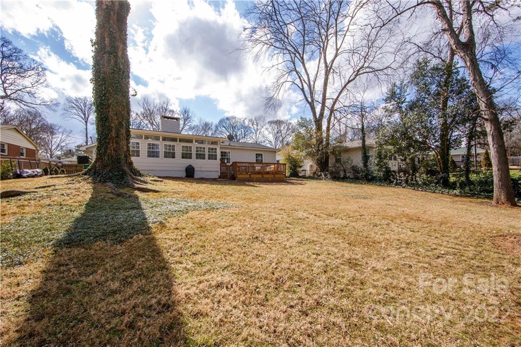 5539 Murrayhill Road Charlotte, NC 28210 - Photo 40 of 46 a view of a yard with trees in the background