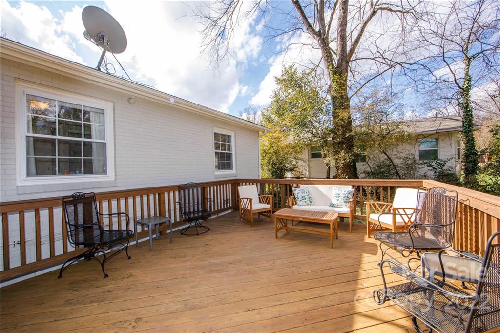 5539 Murrayhill Road Charlotte, NC 28210 - Photo 44 of 46 a view of a roof deck with wooden floor and fence