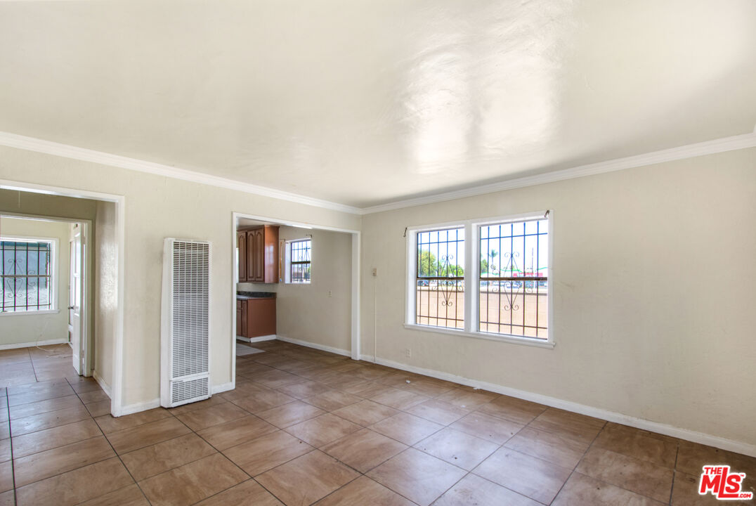 521 South Bullis Road Compton, CA 90221 - Photo 4 of 16 an empty room with windows and closet