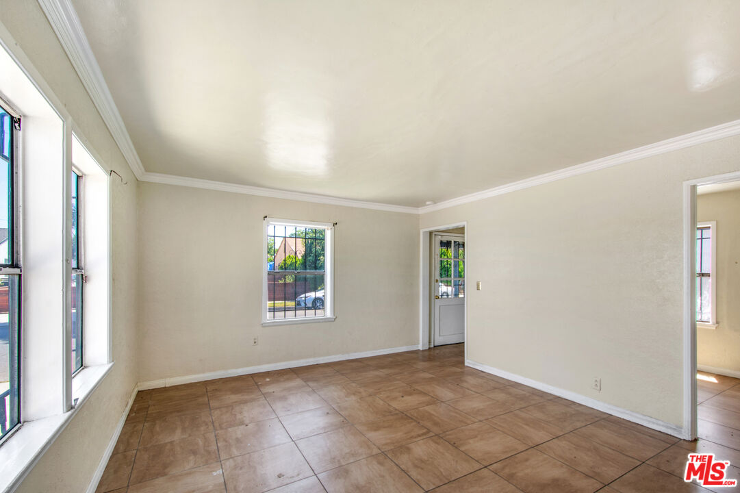 521 South Bullis Road Compton, CA 90221 - Photo 6 of 16 an empty room with windows