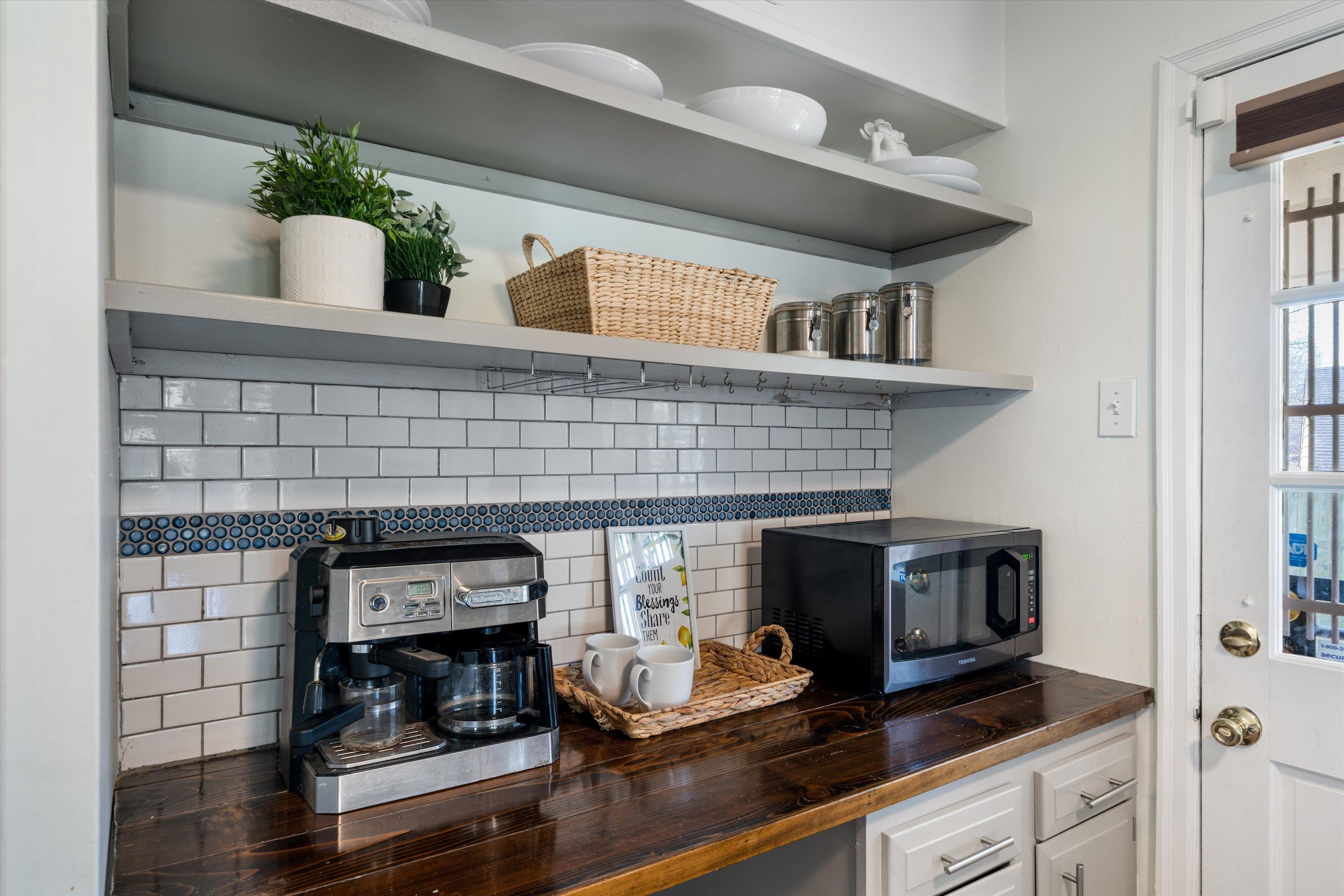 1081 Wilbec Road Memphis, TN 38117 - Photo 10 of 18 a kitchen with a stove and cabinets