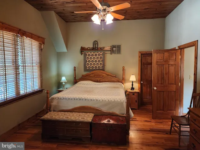 a kitchen with stainless steel appliances granite countertop a sink a stove and refrigerator