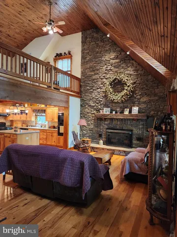 a view of a room with gym equipment and a window