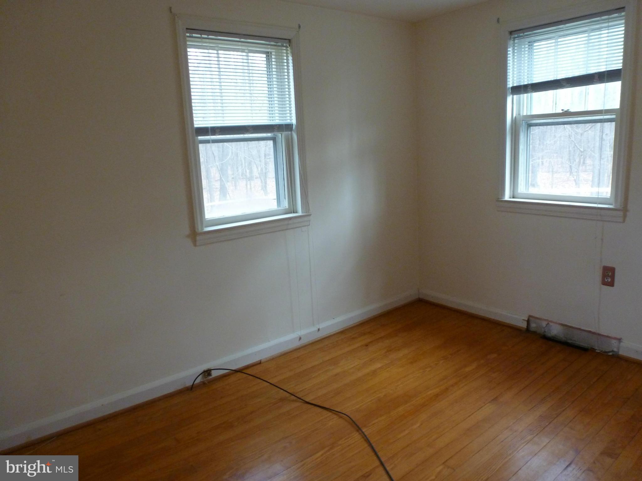 10321 Bethel Road Frederick, MD 21702 - Photo 13 of 18 an empty room with windows