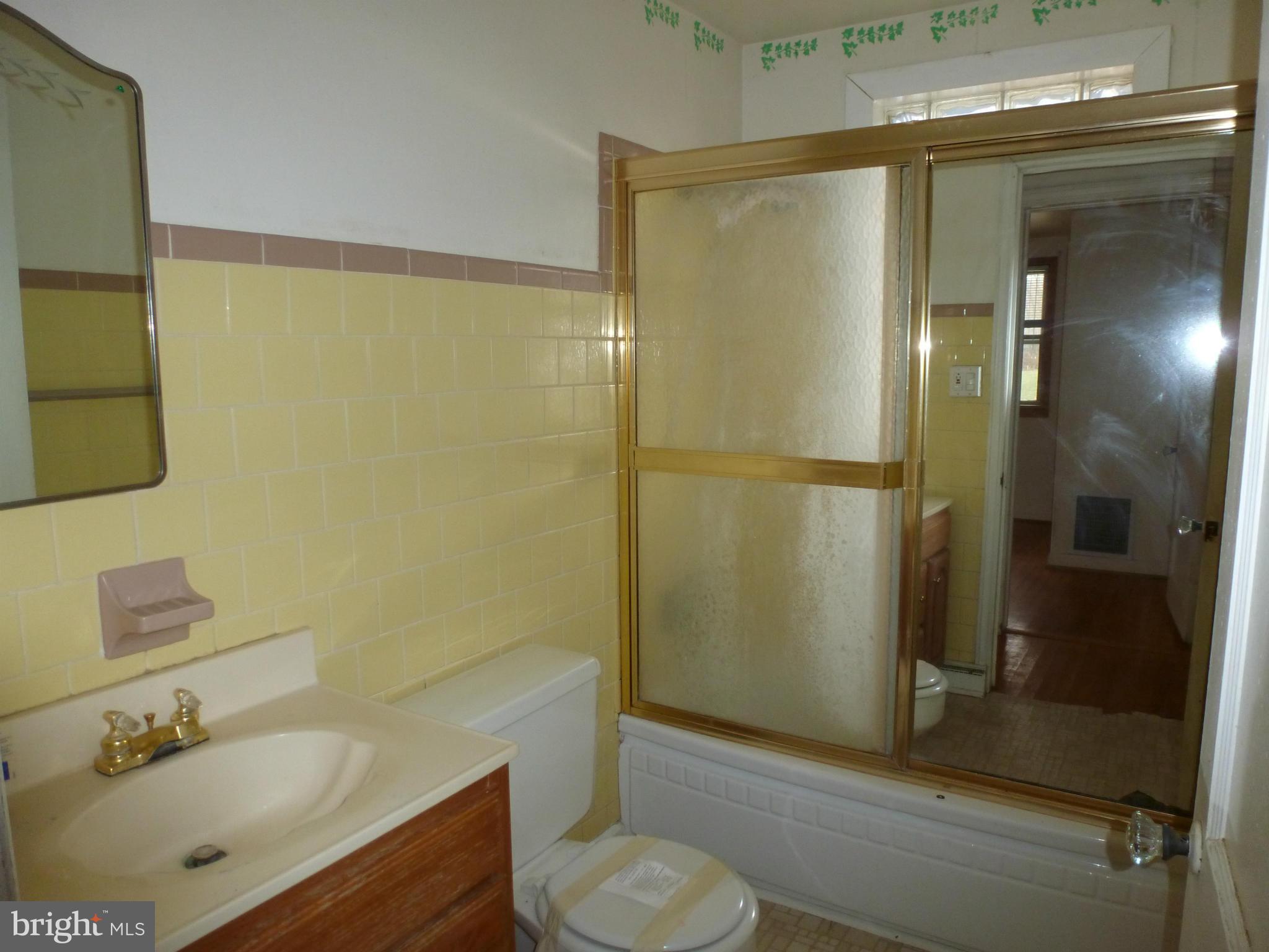 10321 Bethel Road Frederick, MD 21702 - Photo 15 of 18 a bathroom with a sink and a mirror