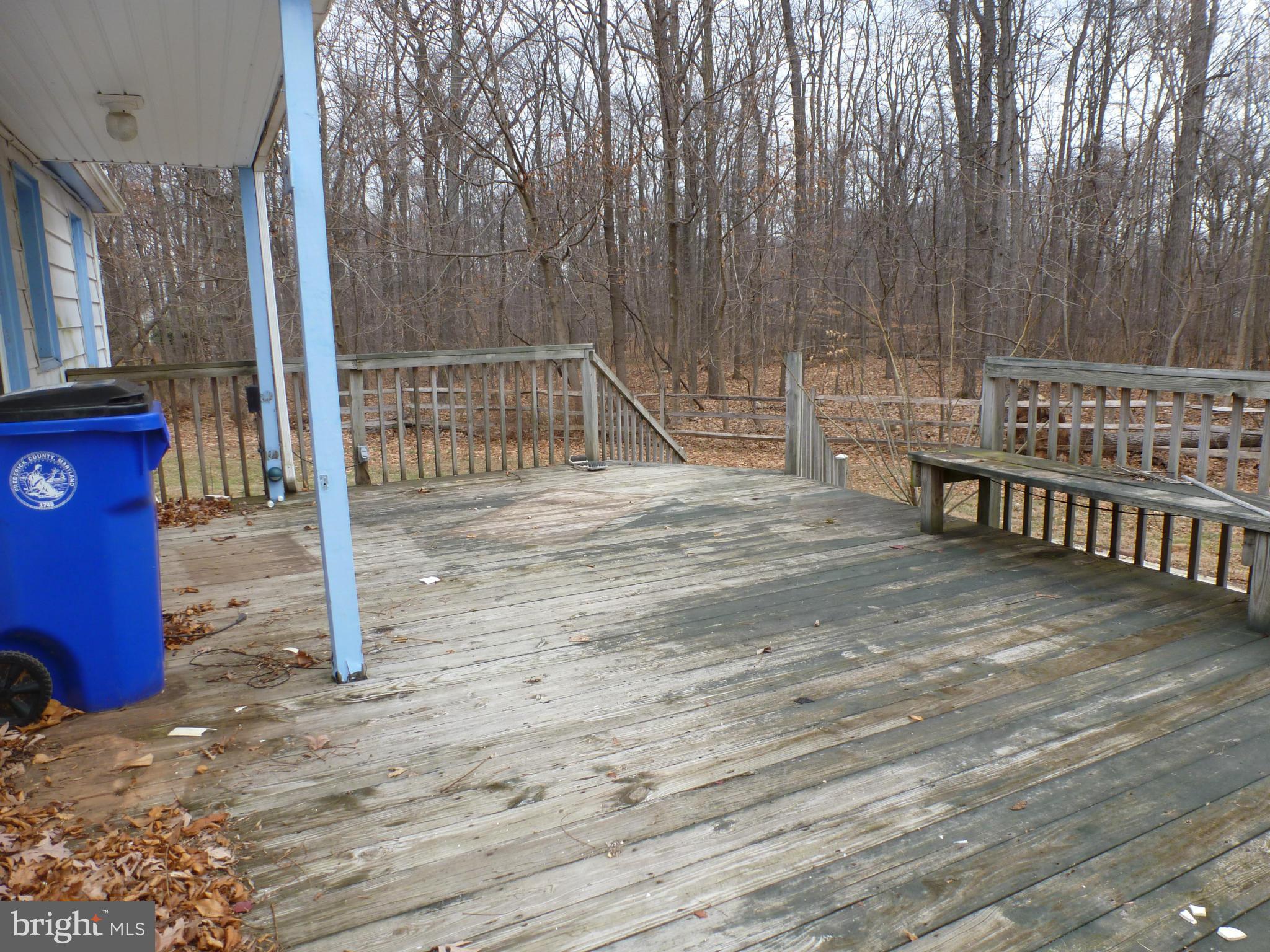 10321 Bethel Road Frederick, MD 21702 - Photo 3 of 18 a view of a bench in the patio