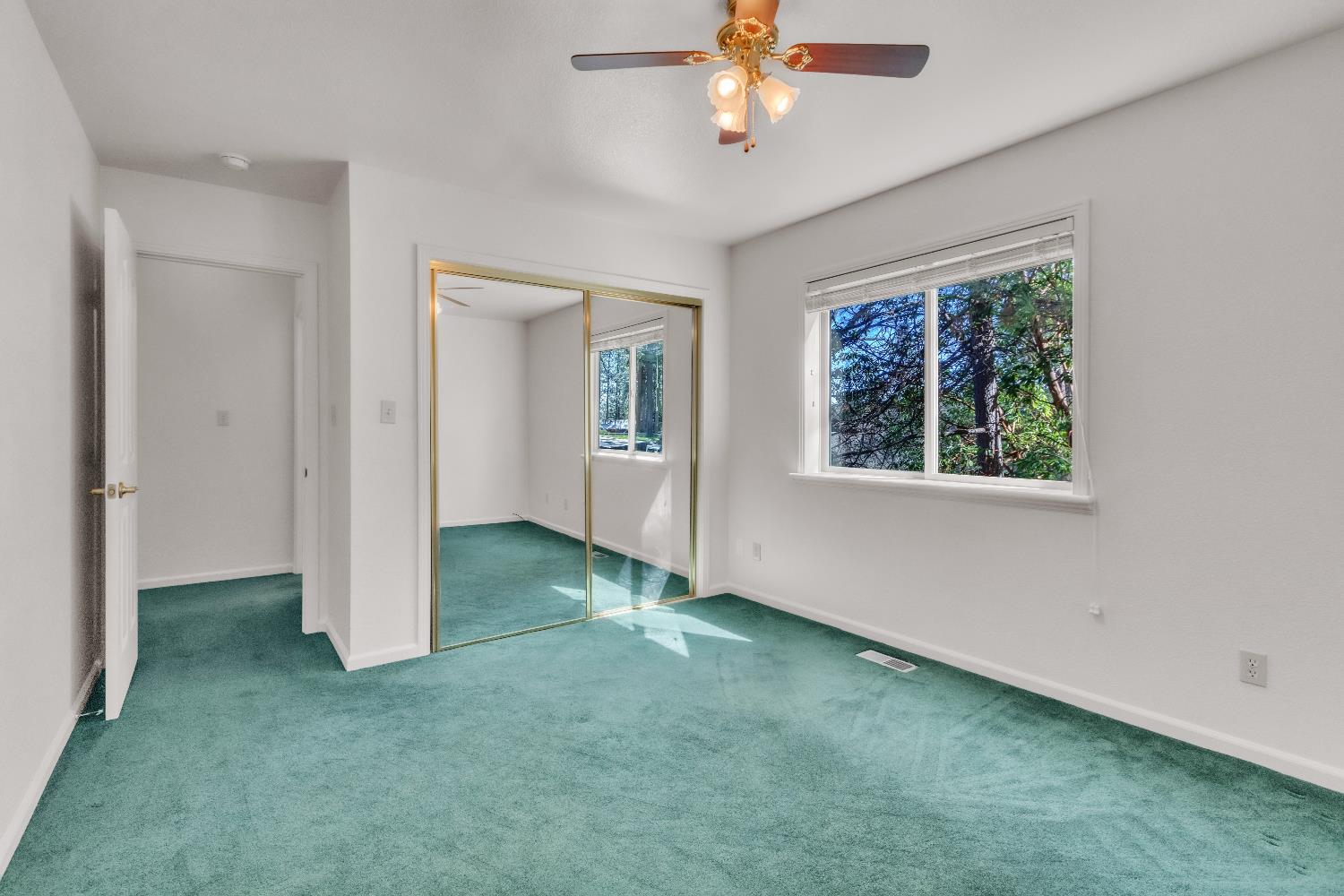 19665 Eagle Ridge Road Foresthill, CA 95631 - Photo 15 of 39 an empty room with a empty space and windows
