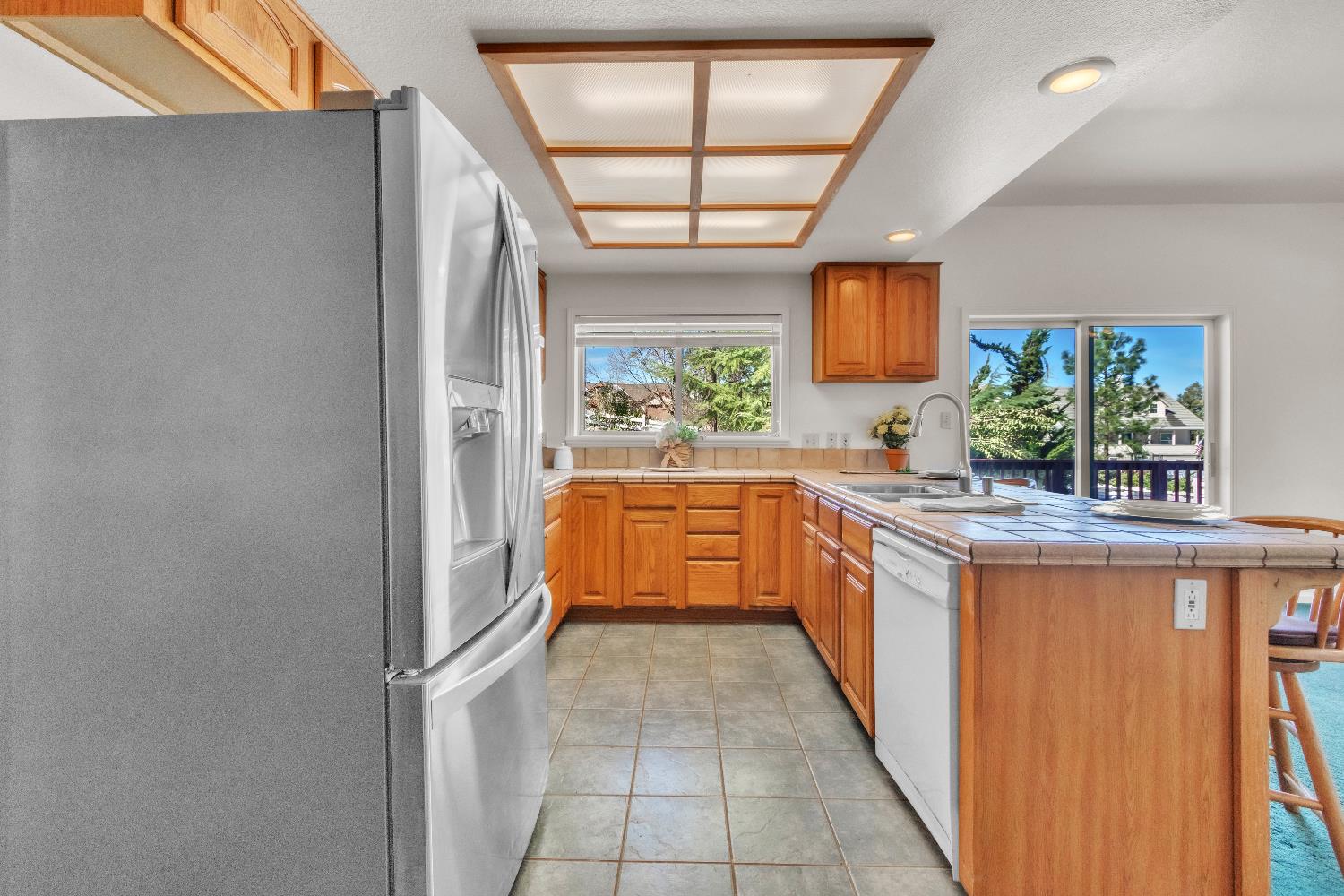 19665 Eagle Ridge Road Foresthill, CA 95631 - Photo 19 of 39 a bathroom with a sink and a large mirror