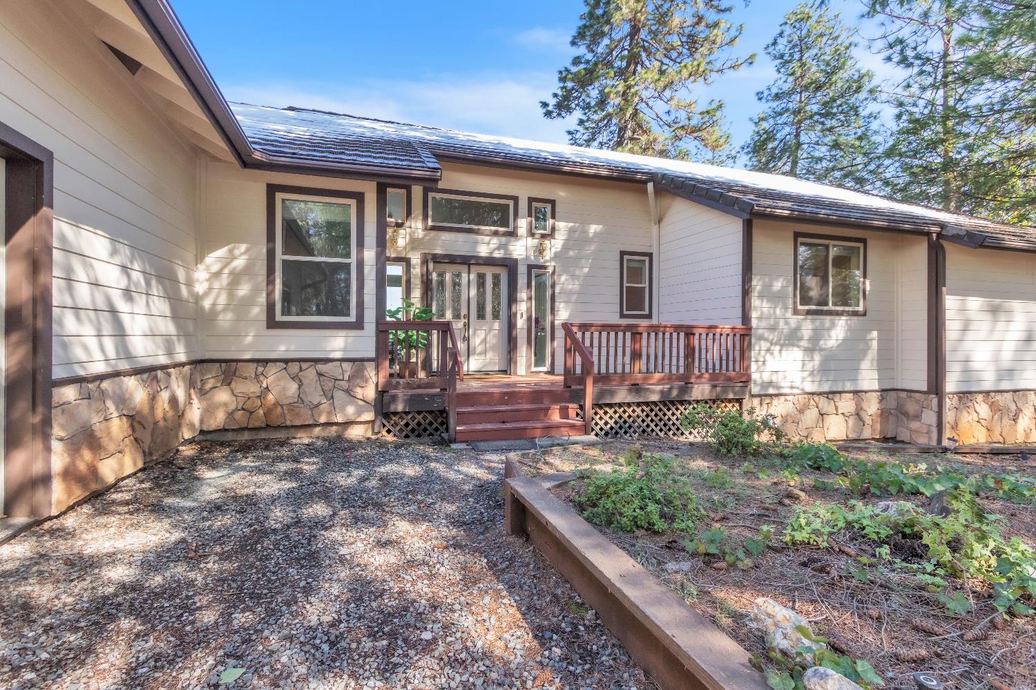 19665 Eagle Ridge Road Foresthill, CA 95631 - Photo 2 of 39 a view of a house with backyard and sitting area