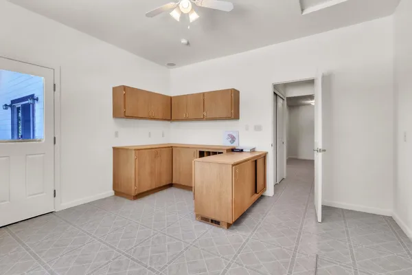 a kitchen with a cabinets and counter space